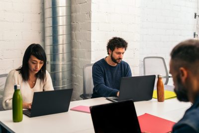 office-colleagues-working-together-on-laptops-at-w-2026-01-09-00-54-24-utc