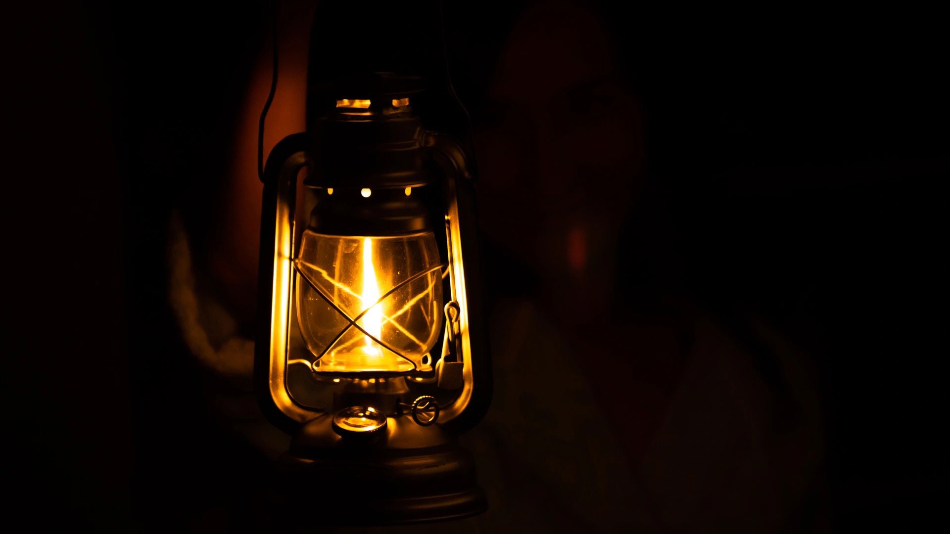 Lit lantern on dark background