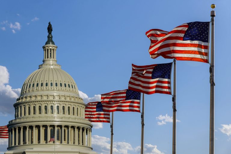 american-flags-waving-near-us-capitol-building-2026-03-11-04-23-26-utc